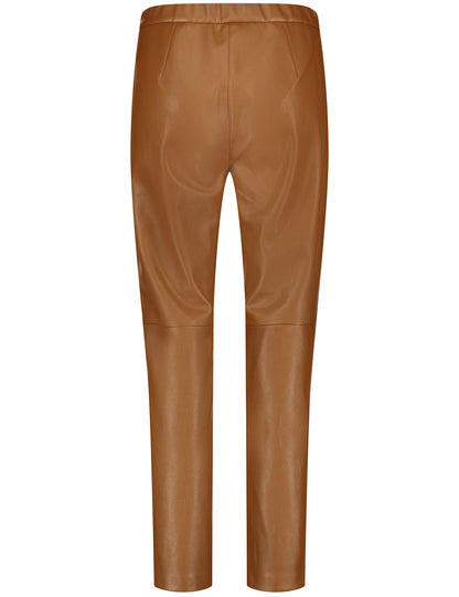 Slim trousers in leather look