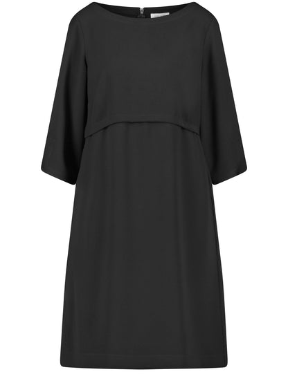 Short dress with dividing seam